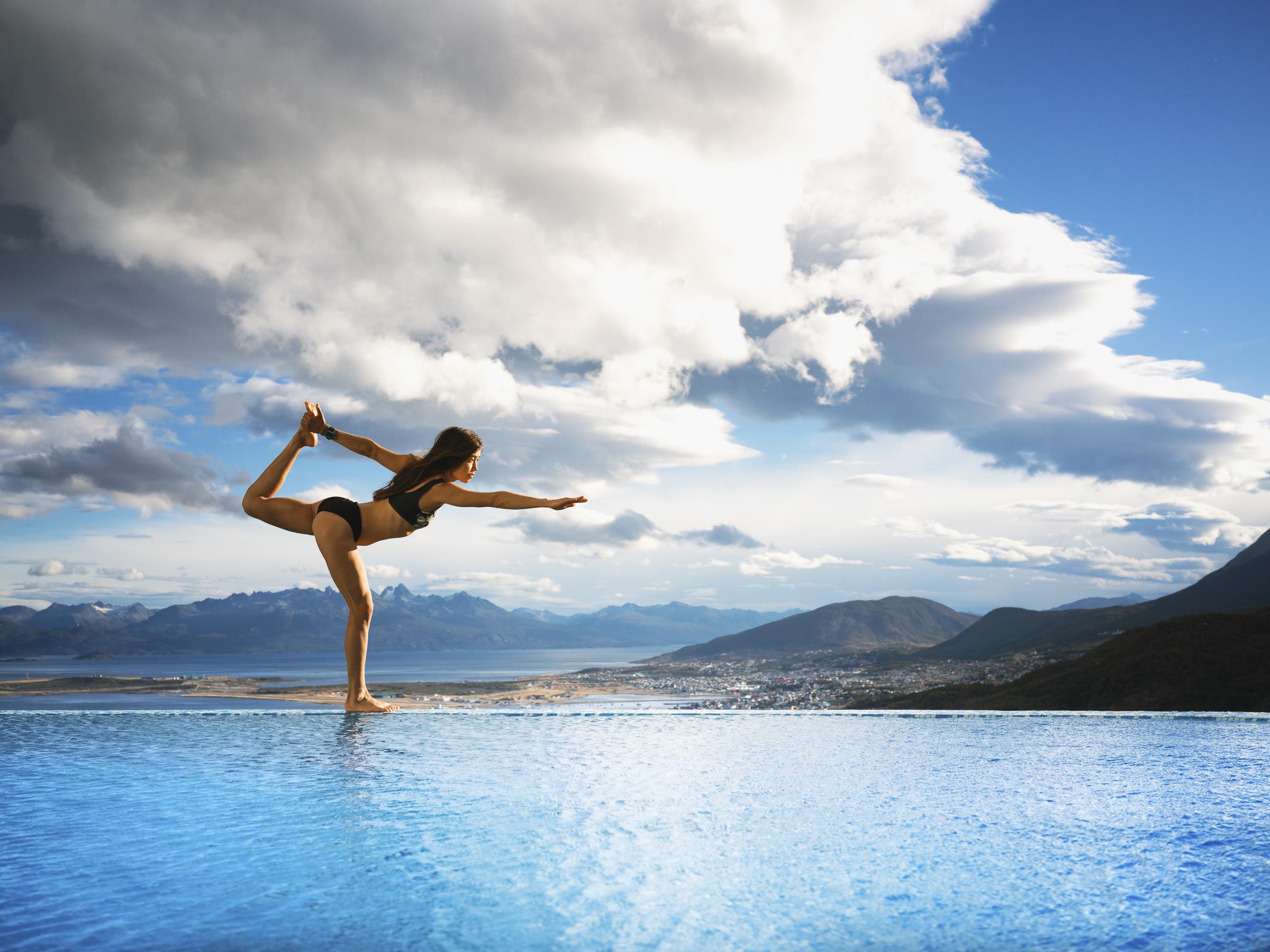 Arakur Ushuaia Resort & Spa Kültér fotó A woman practicing yoga
