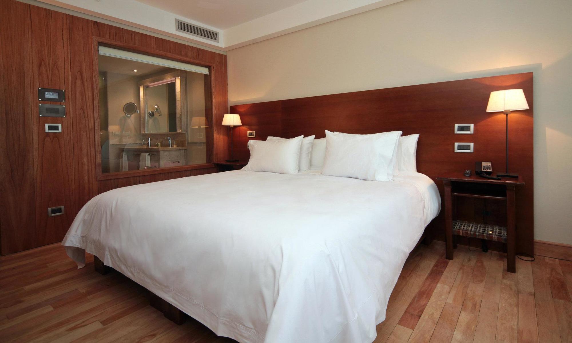 Arakur Ushuaia Resort & Spa Kültér fotó A bedroom at the hotel